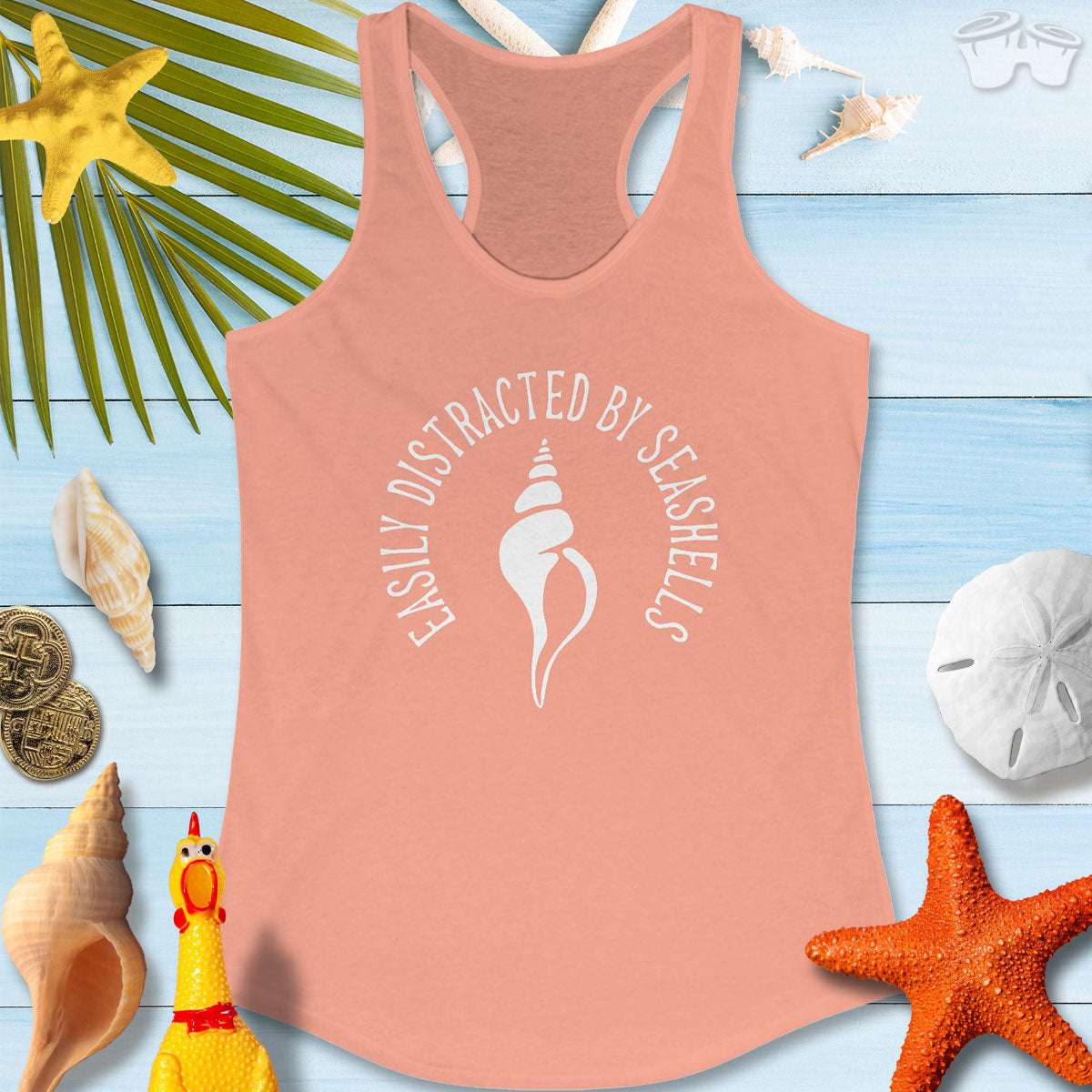 Beachy Women's Racerback Tank with seashell print, perfect for beach lovers and summer vibes.