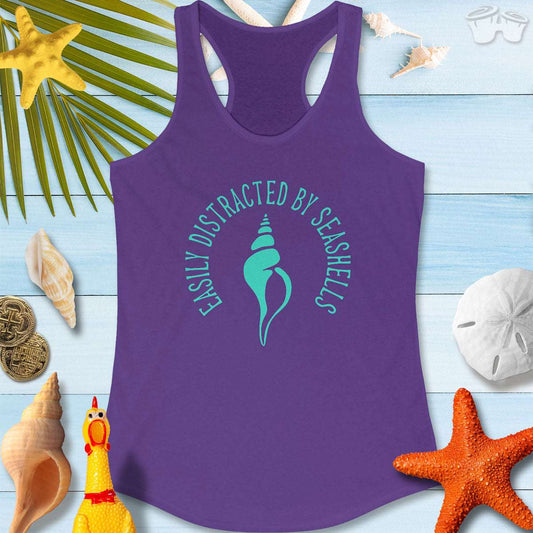 Beachy Women's Racerback Tank featuring 'Easily Distracted By Seashells' print, perfect for beach lovers and summer fun.