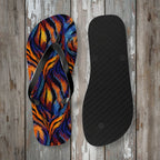 Colorful zebra-patterned sandal and black insole on a wooden surface