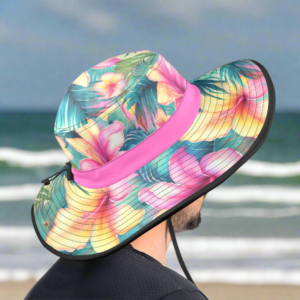 Colorful floral bucket hat with pink band on a dude getting ready to go surf fishing