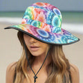 Colorful tie-dye bucket hat worn by a model on a Key West Beach