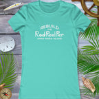 Teal t-shirt with 'Rebuild the Rod Reel Pier Anna Maria Island' text on a wooden background with beach elements.