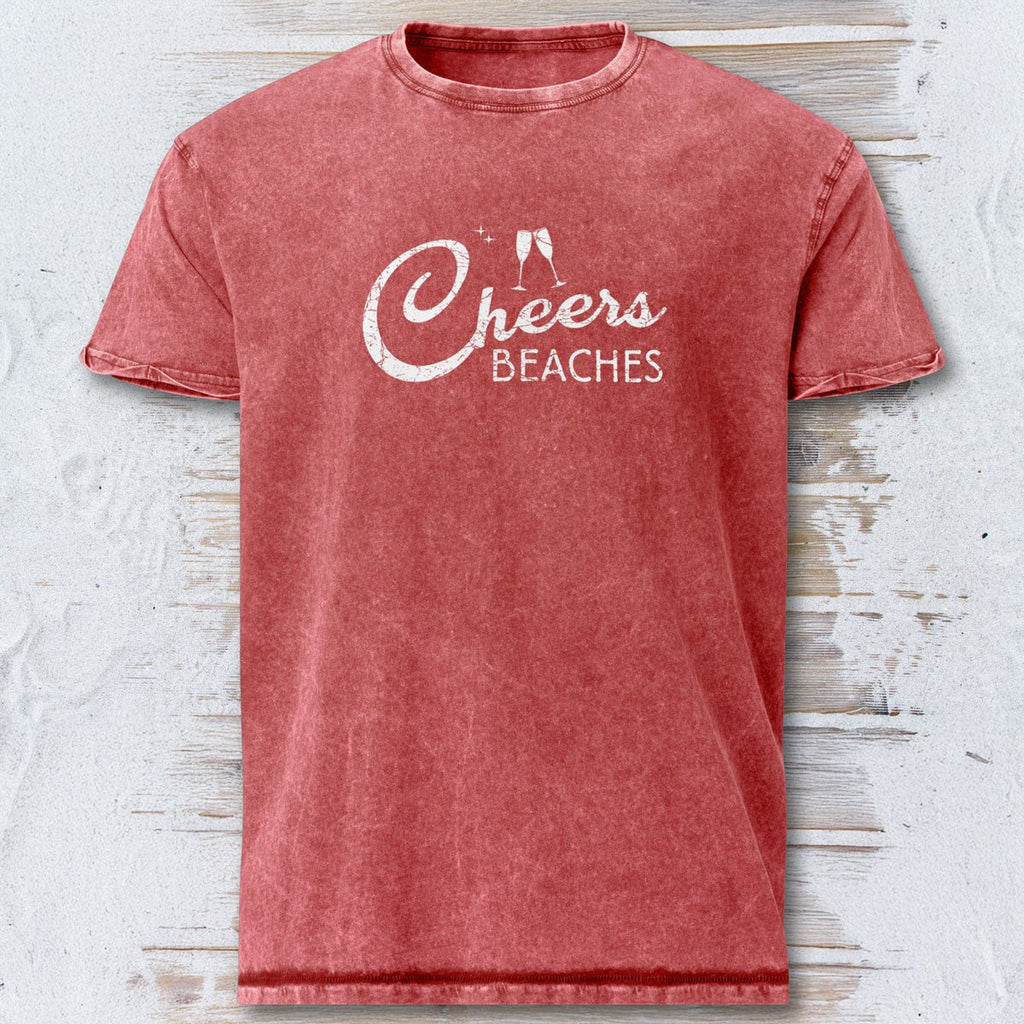 Red t-shirt with 'Cheers Beaches' text on a textured white background