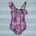 Seahorse Swimsuit with ruffles along the top over a rustic nautical wood background