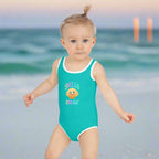 Girl's One Piece Toddlers' Swimsuit saying SHello Turquoise worn by a toddler on Pensacola Beach
