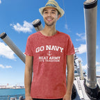 Man wearing a red 'GO NAVY BEAT ARMY IT'S TRADITION' t-shirt on a ship with blue sky and clouds in the background.