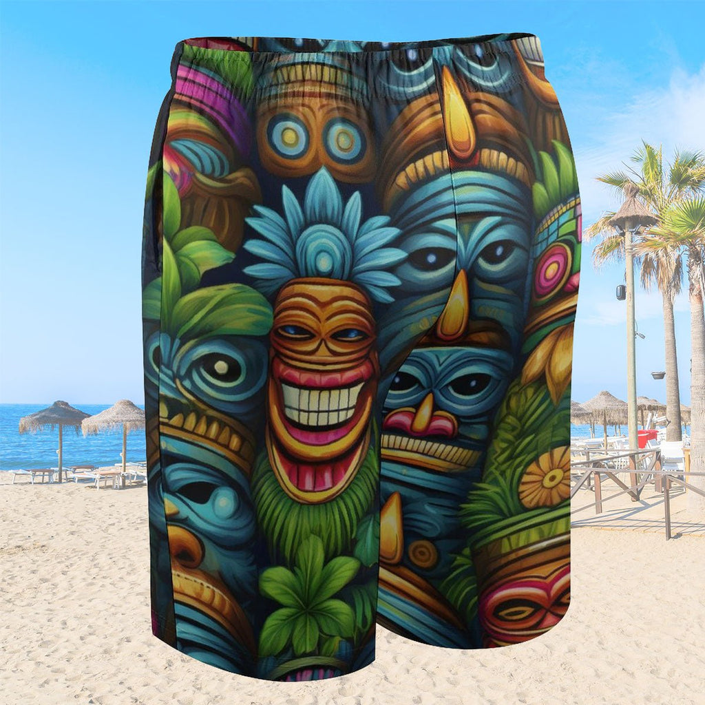 Colorful tiki mask patterned shorts on a beach background