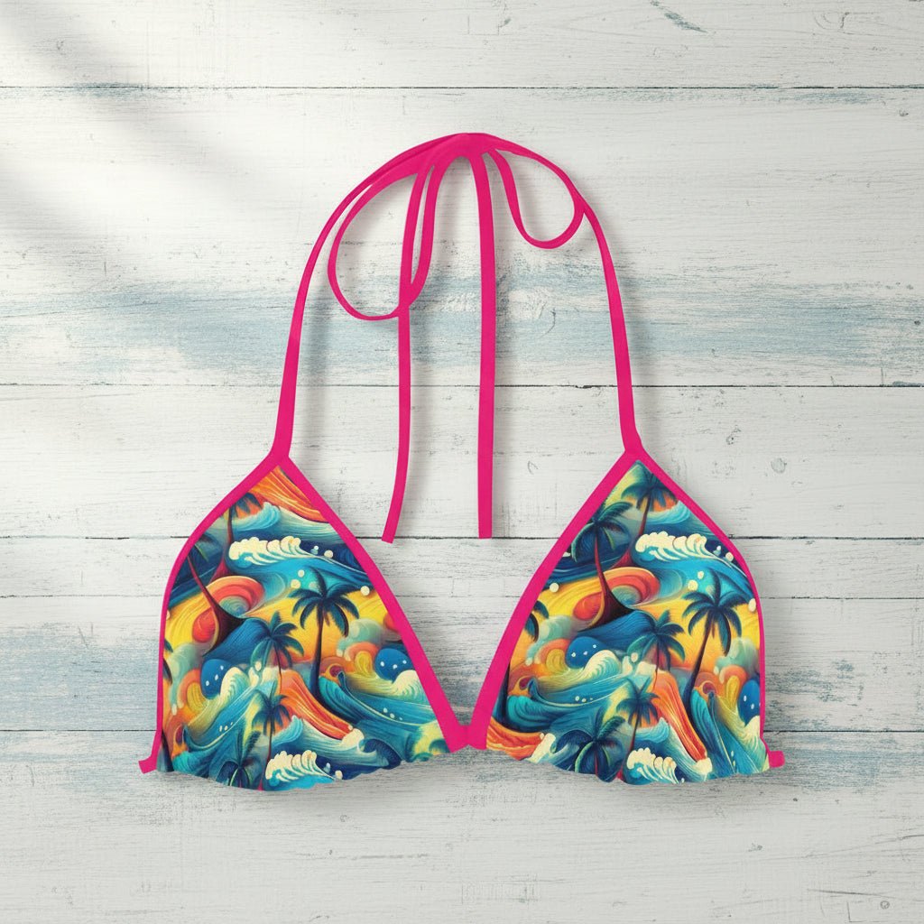 Colorful bikini top with tropical design on a white background