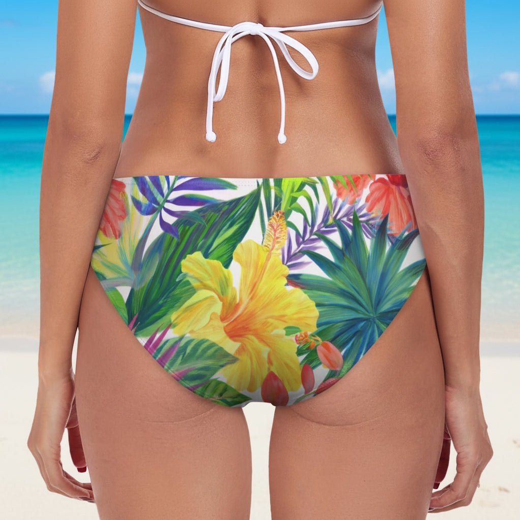 Colorful tropical floral bikini bottom on a white background
