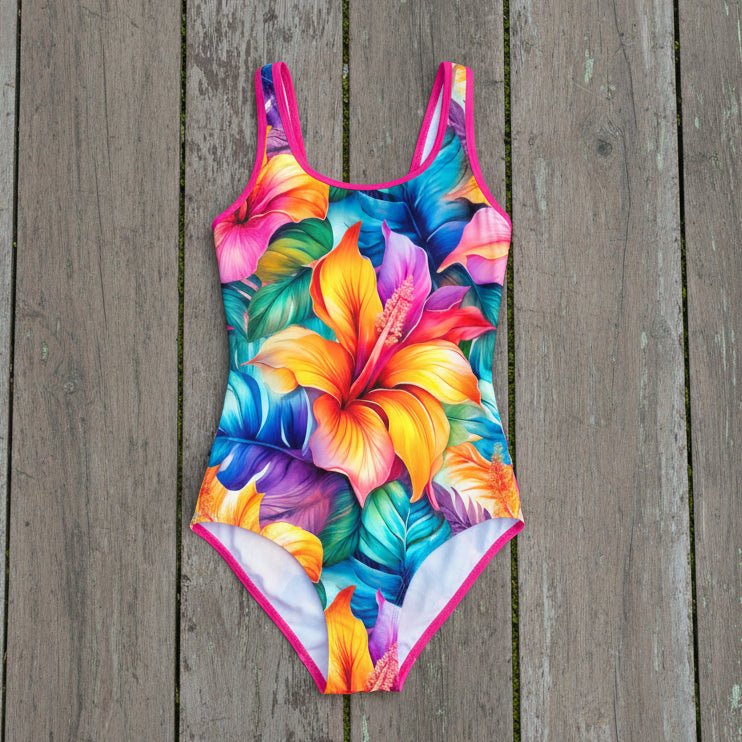 colorful floral swimsuit on a rustic nautical wood background