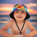 Child wearing a colorful floral bucket hat with a beach background