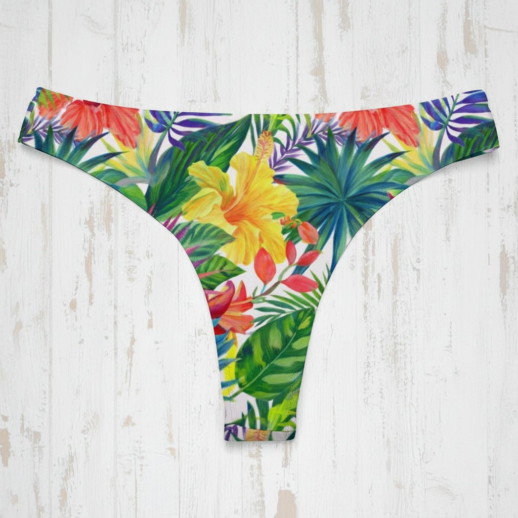 Colorful tropical floral bikini bottom on a rustic wood background