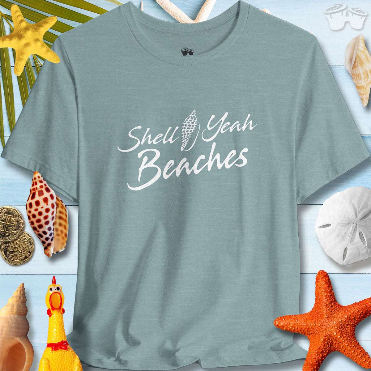 Unisex Shell Yeah Beaches tee with sea shell design, perfect for summer vibes and beach outings.