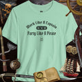 Pirate Party 3001c Bella Canvas Funny Pirate Saying T-Shirt in mint green, featuring 'Work Like A Captain, Party Like A Pirate' slogan.