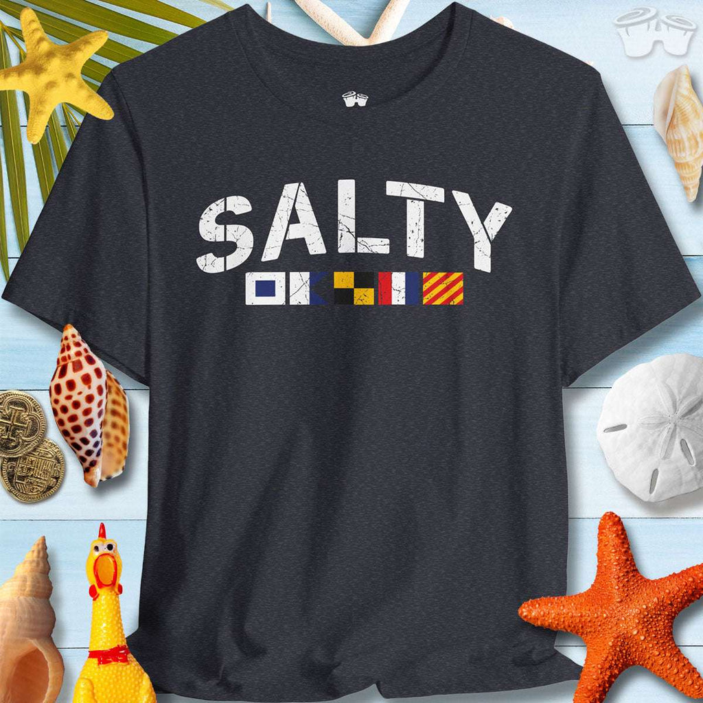 Salty T-shirt featuring nautical signal flags on a beach-themed background, perfect for ocean lovers and summer outings.