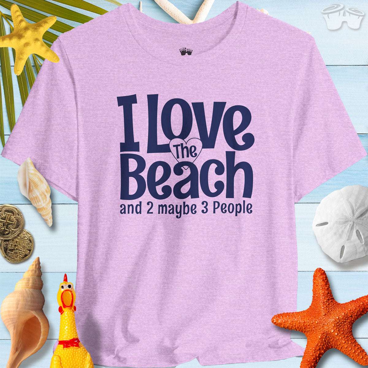 I Love The Beach clever t-shirt in lavender with humorous text, perfect for beach lovers and casual outings.