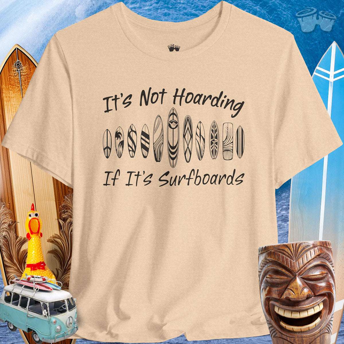 Surfboard Lover Unisex Tee with humorous quote 'It's Not Hoarding If It's Surfboards', perfect for beach lovers.