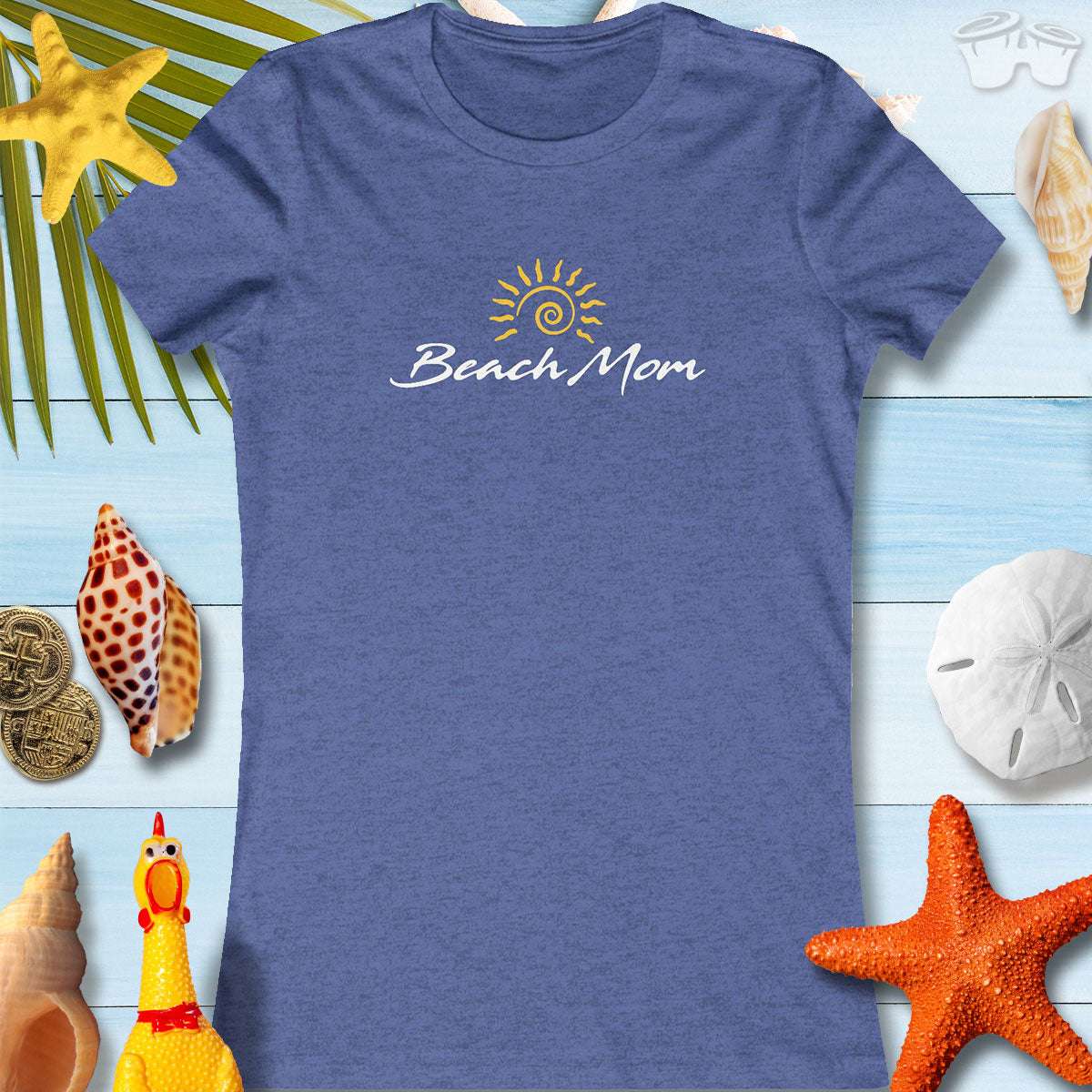 Beach Mom tee for women, perfect for summer fun and Mother's Day, set against beach-themed decorations.