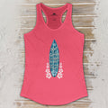 Pink tank top with a graphic design on a wooden surface