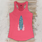 Pink tank top with a graphic design on a wooden surface