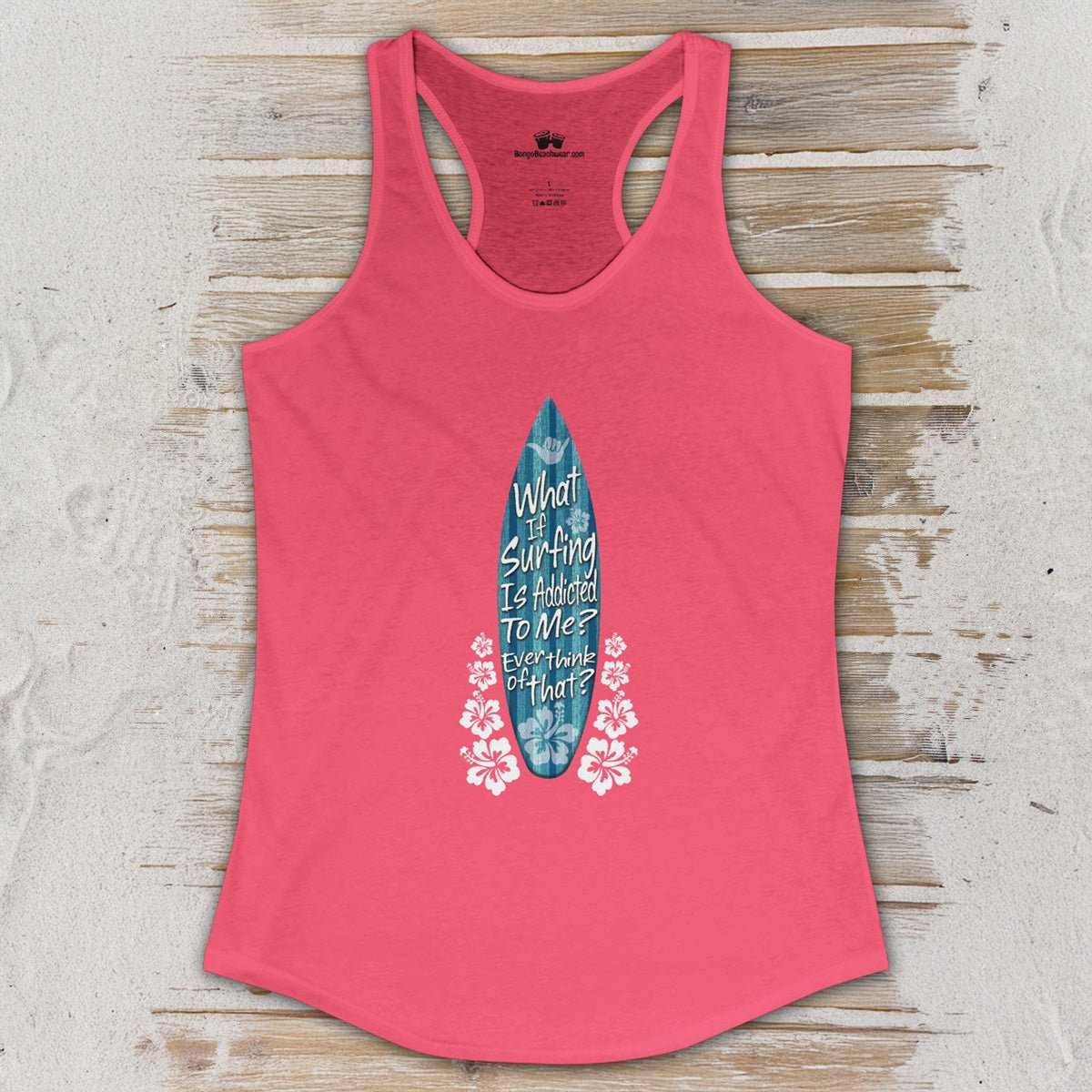 Pink tank top with a graphic design on a wooden surface