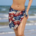 Bikini model wearing a Bongo Beachwear American Flag Pattern beach wrap celebrating Independence Day on Daytona Beach 