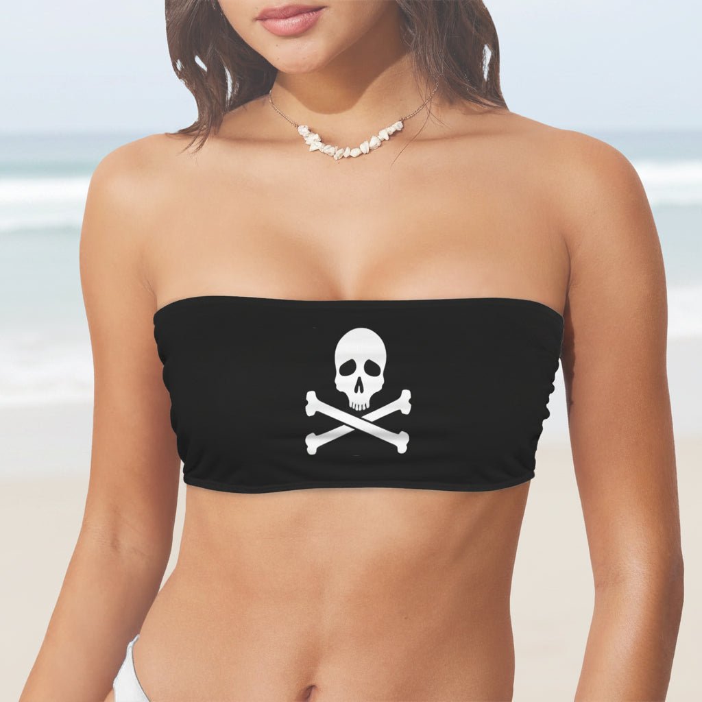 Black strapless Jolly Roger top with skull and crossbones design worn by a model on a white background