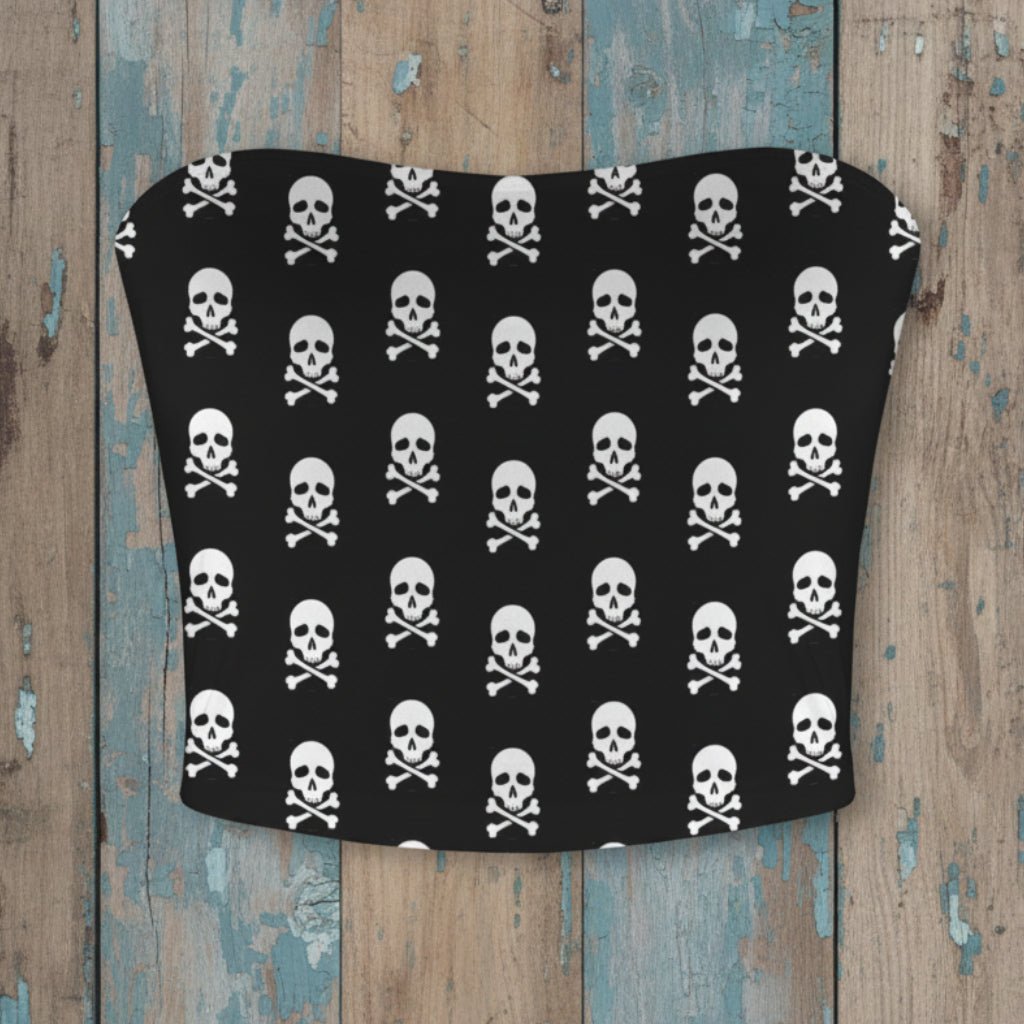 Black strapless top with white skull and crossbones pattern on a rustic nautical wood background