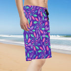 Dude wearing Purple board shorts with colorful seashell pattern on a Pensacola Beach