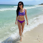 beautiful woman with long black hair walking through the waves on Sanibel Island