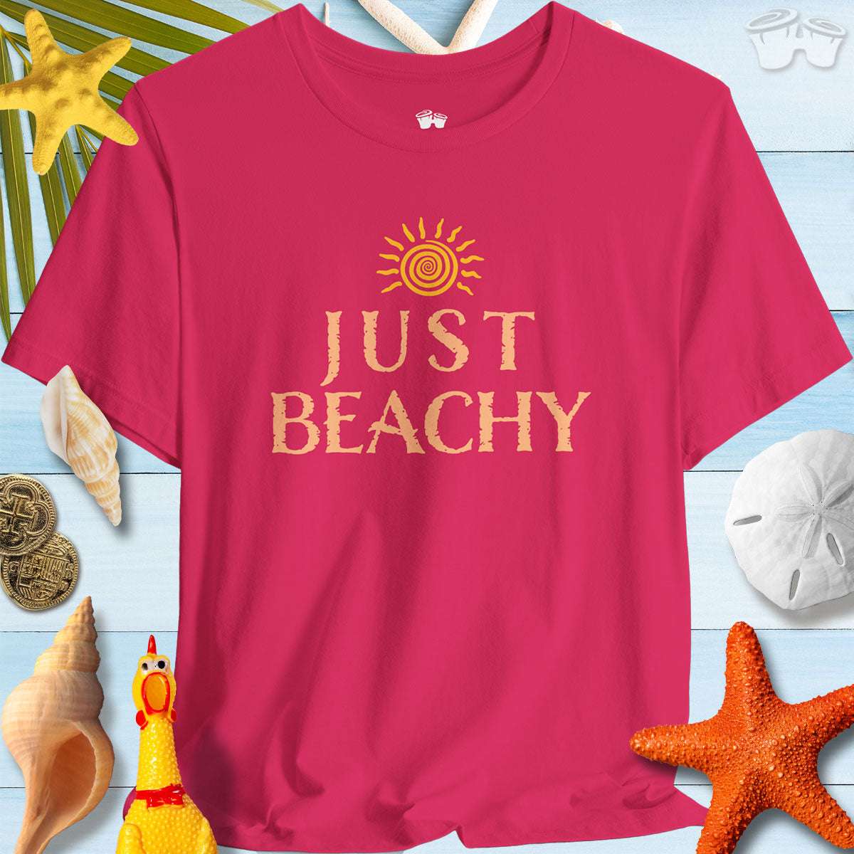 Just Beachy Bella T-Shirt in tropical pink with sun design, perfect for beach day vibes and summer fun.