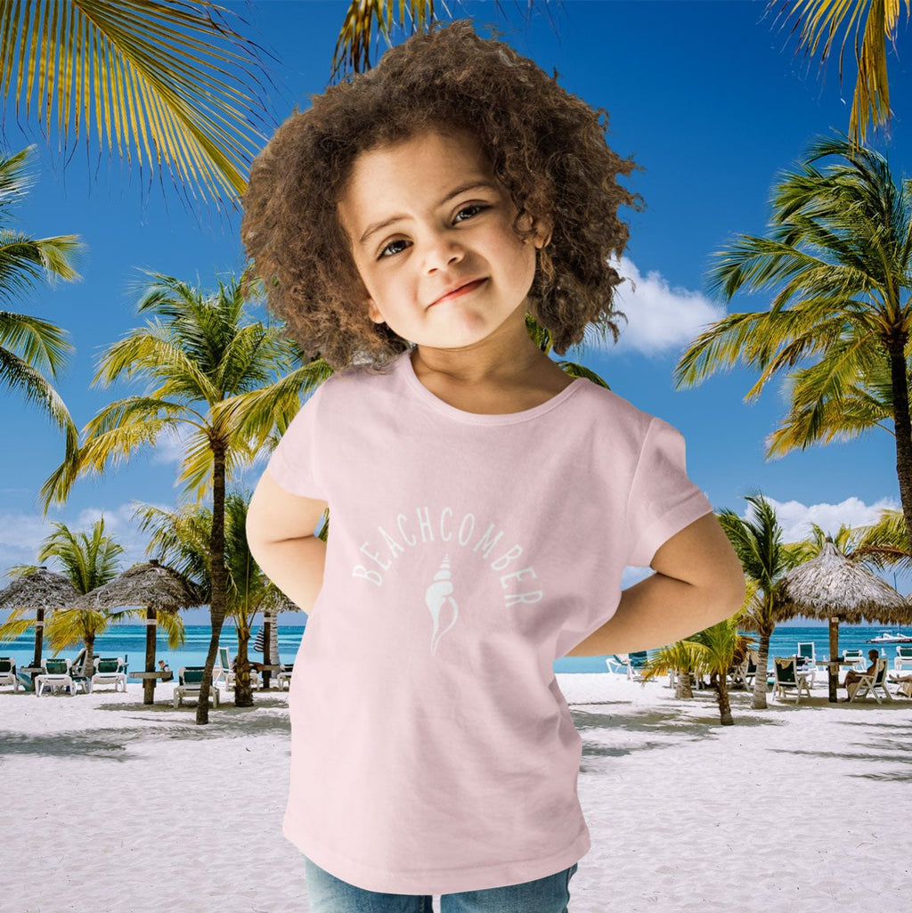 Cute little girl wearing Beachcomber Toddler T-Shirt in a tropical paradise