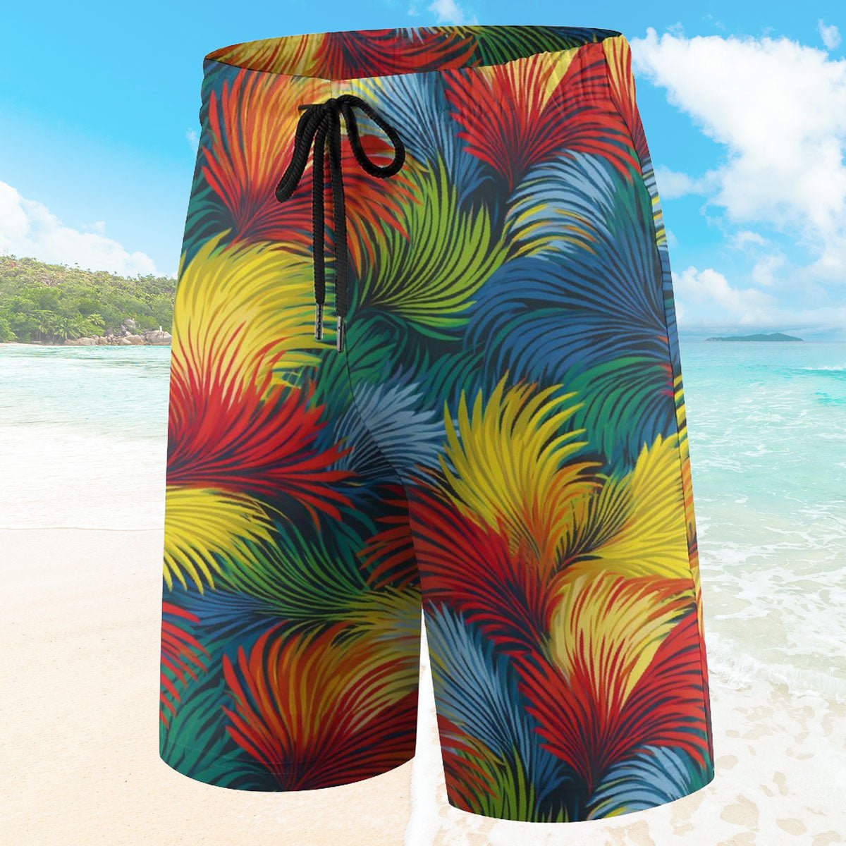 Colorful tropical leaf patterned shorts on a beach with ocean and sky background