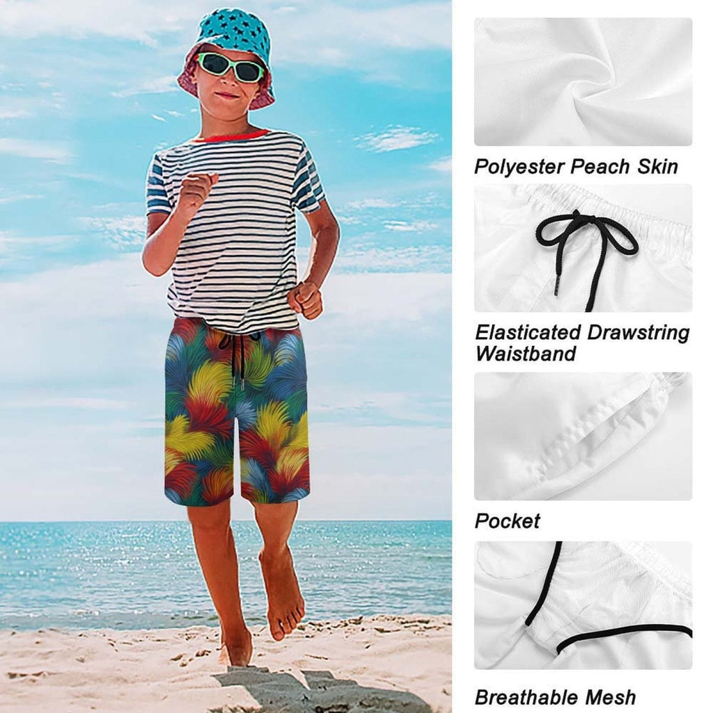 Child wearing a striped shirt and colorful beach shorts on a beach with fabric details shown.