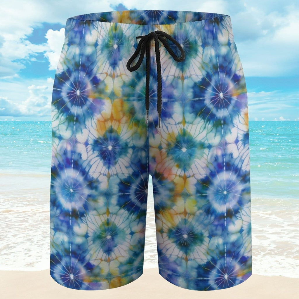 Colorful tie-dye shorts with a beach background