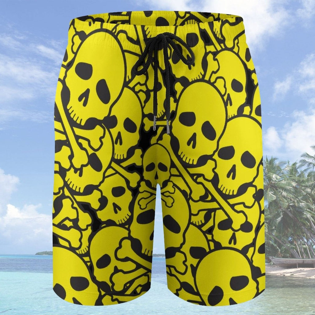 Yellow and black skull-patterned shorts with a beach background