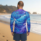 Guy wearing a blue and purple wave-patterned shirt on La Jolla Beach