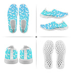 A four-panel product collage showing a pair of slip-on water shoes from multiple angles: top-down, side views, and sole views. The shoes have a bright aqua blue and white shark pattern on the upper, with white soles and gray footbeds.
