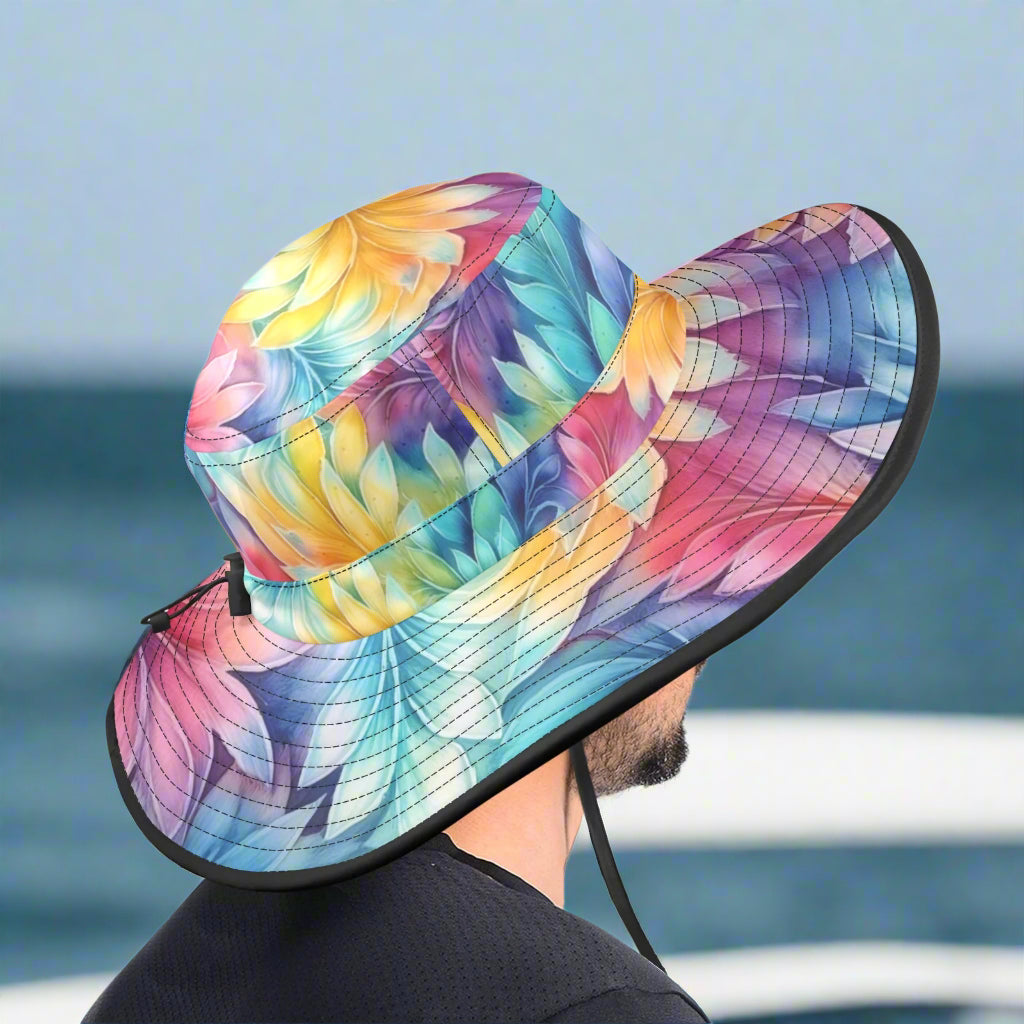 Colorful patterned sun hat worn by a guy driving a sailboat