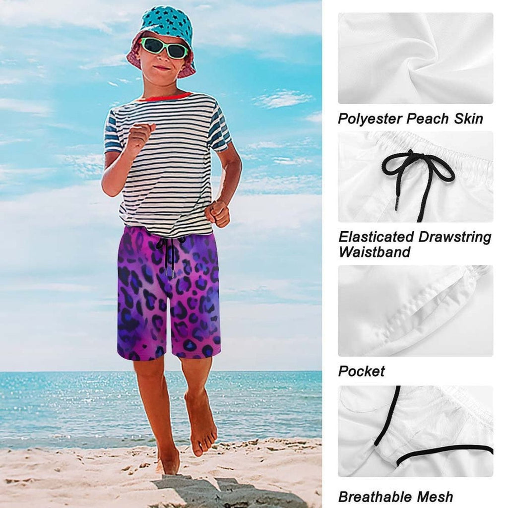 Child wearing a striped shirt, leopard print shorts, and a bucket hat on a beach with close-up details of the shorts.