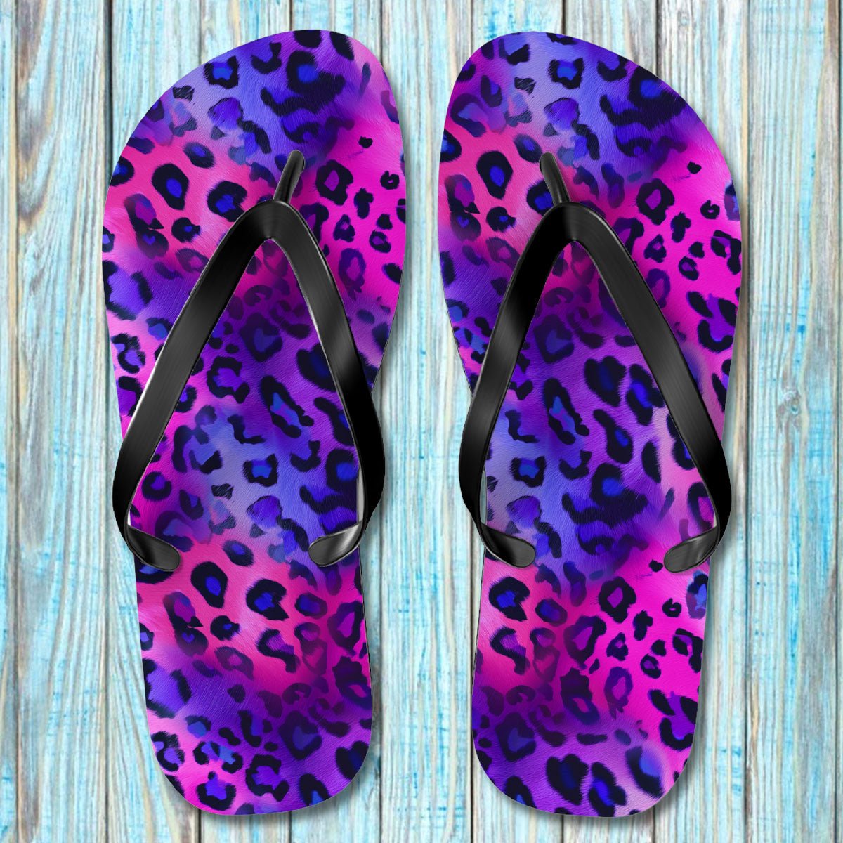 Leopard Spot Flip Flops on rustic nautical wood background