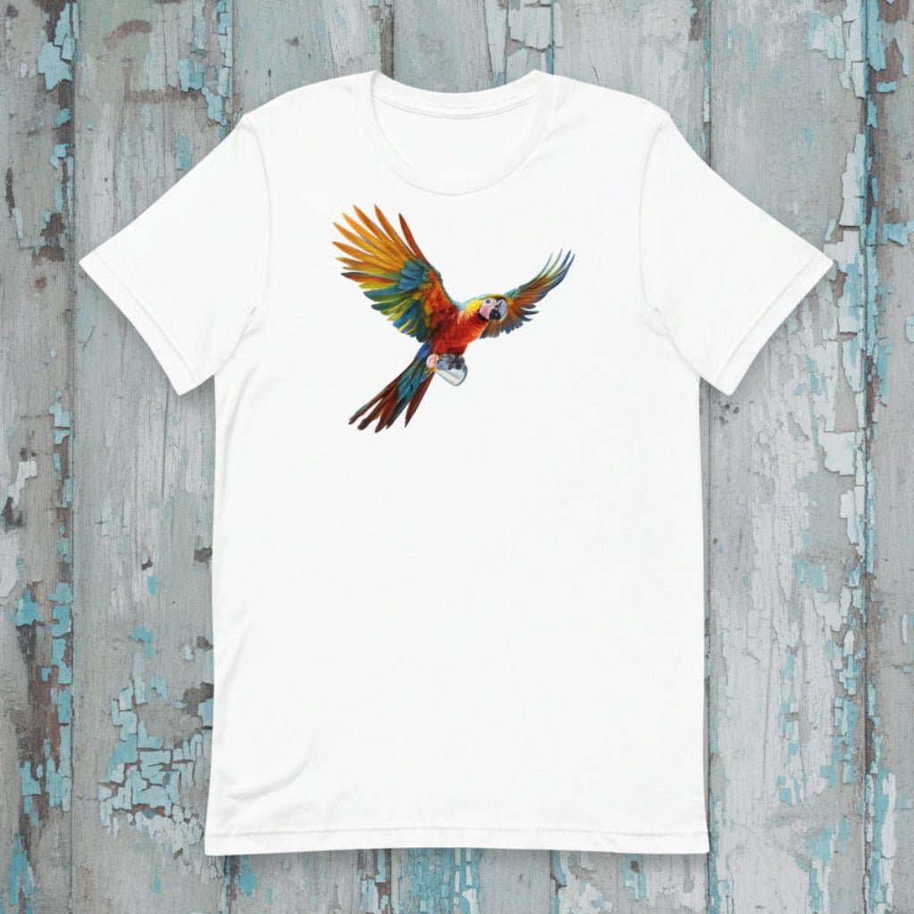 White t-shirt with a colorful parrot design on a rustic wooden background