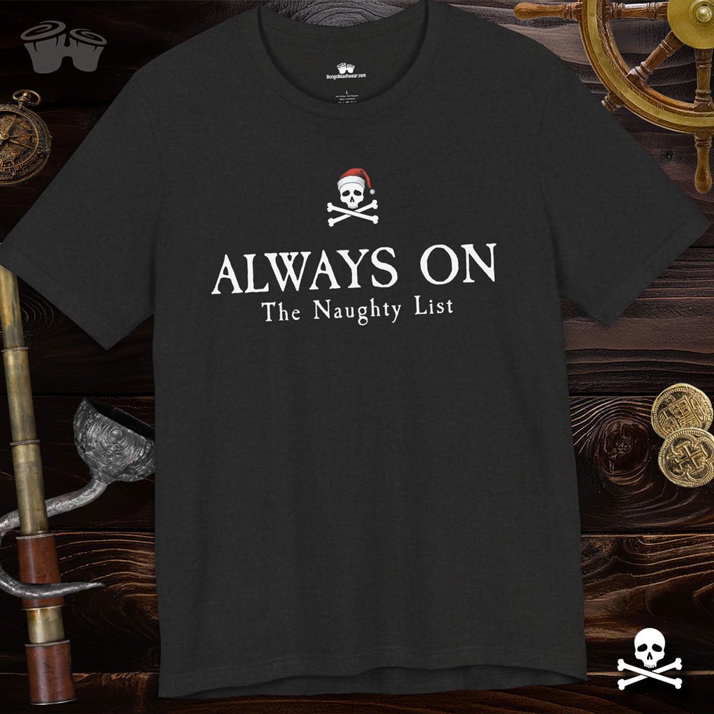 Black t-shirt with pirate-themed text on a wooden background with ship wheel and coins.