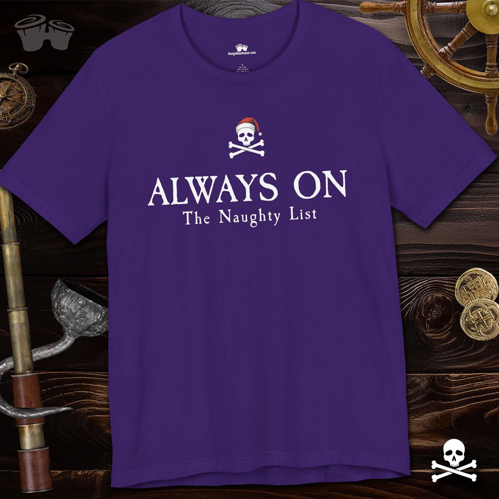 Purple t-shirt with pirate-themed text on a wooden background with ship wheel and coins.