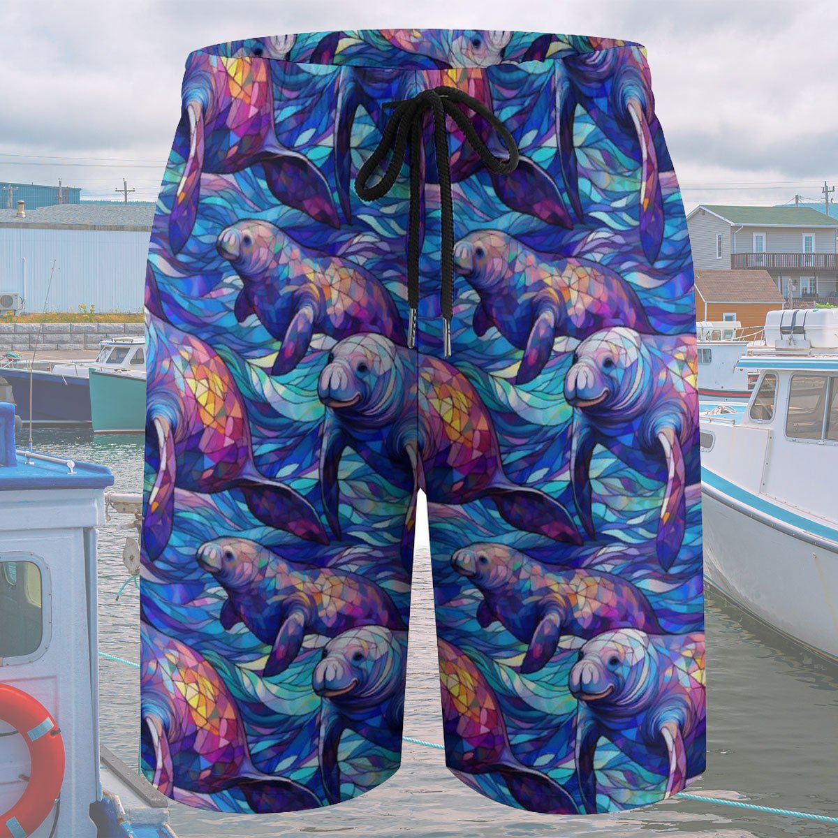 Colorful shorts with manatee pattern on a dock background