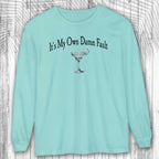 Chalky Mint long-sleeve margarita tee shirt with a graphic and text on a wooden background