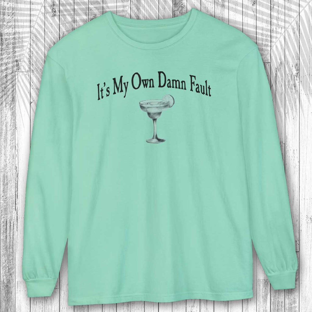 Island Reef green long-sleeve margarita tee shirt with a graphic and text on a wooden background