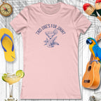 Pink t-shirt with a cocktail graphic and text, surrounded by party items on a wooden background