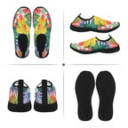 A four-panel product collage showing a pair of slip-on water shoes from multiple angles: top view, side view, back view, and outsole view. The shoes have a bright tropical floral and leaf print with yellow, red, green, blue, and purple tones, plus black soles and black footbeds.