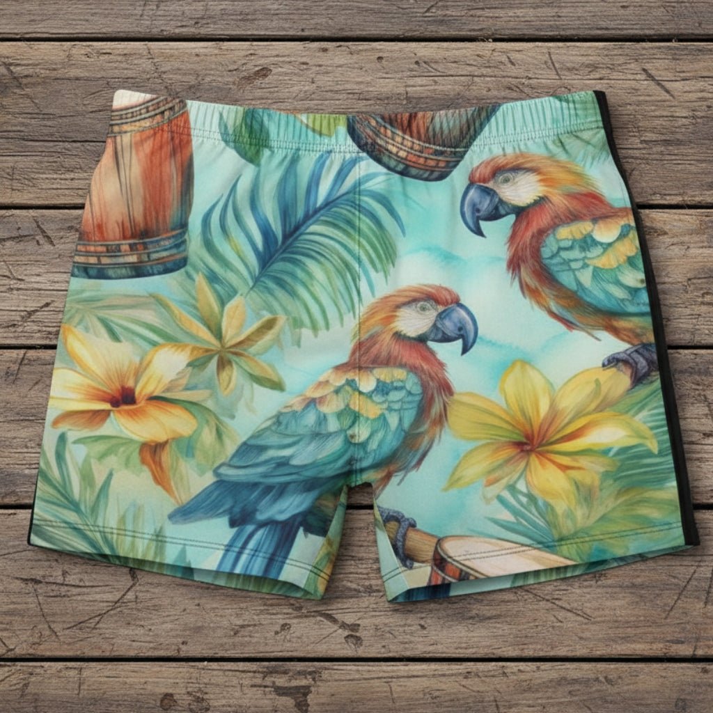 Tropical-themed swim shorts with parrots and flowers on a rustic wood background